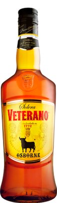 Eine Flasche Veterano mit goldener Etikette und schwarzem Deckel, die die Tradition spanischer Spirituosen verkörpert.