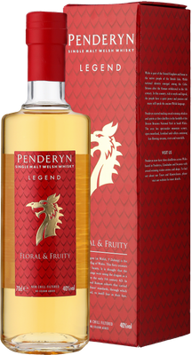 Flasche Penderyn Legend mit rotem Etikett und Flaschenkopf, daneben die rot-gold verzierte Verpackung