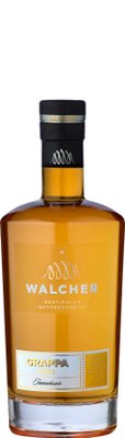 Die Flasche Grappa D'Oro von Walcher, mit einem stilvollen Etikett und einem schwarzen Verschluss, strahlt Raffinesse aus.